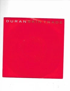 Duran Duran-Skin Trade/We Need You ** UK 7" Vinyl Record W/Pic Sleeve** 1986 - Imagen 1 de 2