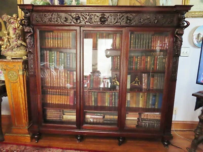  R.J. HORNER  19 C.CARVED FIGURAL 3 DOOR BOOKCASE - Image 1 of 4