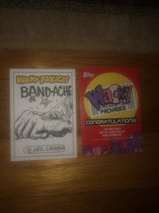 PAQUETES LOCOS 2025 TARJETA DE BOCETO CÁMARA NEIL TOPPS - Imagen 1 de 2