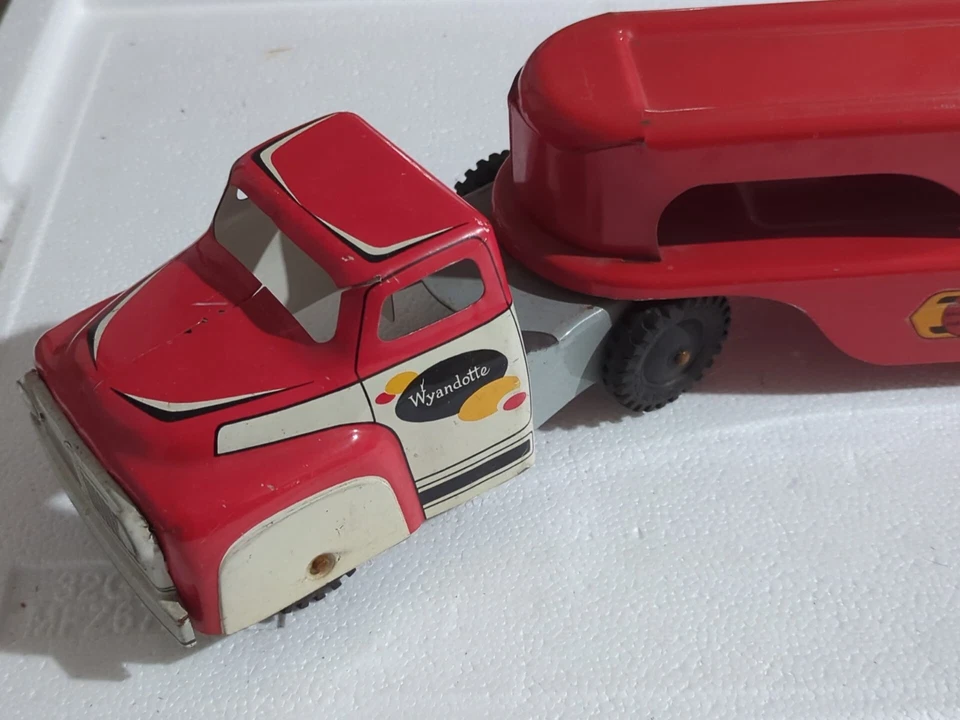 Remolque tractor de transporte vintage Wyandotte Car-A-Van líneas camión de metal juguete Foto 1 de 4