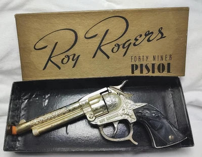 Pistola de casquillo M. A. Henry Roy Rogers Gold Smoker Forty Niner años 50 con caja original Foto 1 de 4