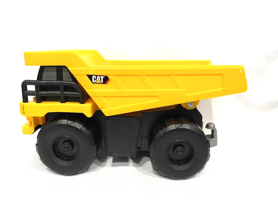 Camión de volteo CAT Mini Machines Construcción Caterpillar 7"x4" Foto 1 de 4