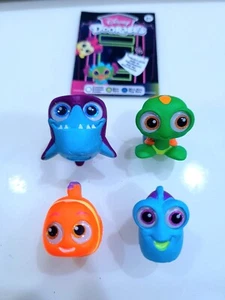 FOUR Disney Doorables Finding Nemo Dory Squirt Bruce Neon Glow Rare Figures - Picture 1 of 2