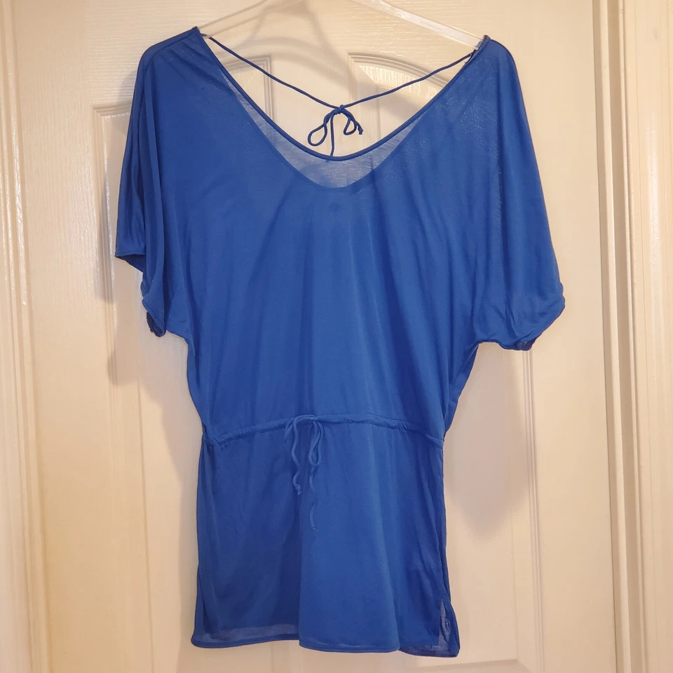 Gravata de poliéster Prana Saida Kaftan feminina tamanho médio azul para natação muito bom estado usado  - Imagem 1 de 4