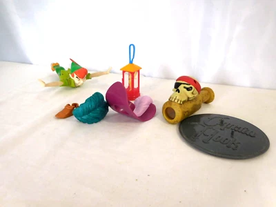 Peter Pan + McDonalds 2006 Pirates of the Caribbean # 5 Skull Telescope + Tinker - Image 1 of 4