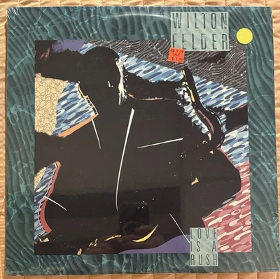 WILTON FELDER - "LOVE IS A RUSH" - MCA (1987) - SEALED/MINT - FREE SHIPPING! - Image 1 of 2