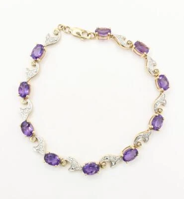 Brazalete Tenis 7.25" 10k Oro Sólido 2 Tonos Amatista Alterna y Onda Diamante Foto 1 de 4