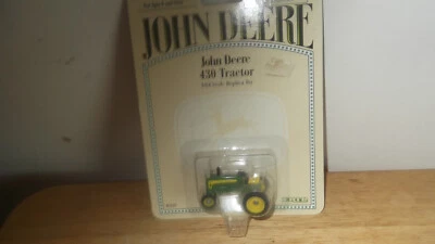 Juguete de granja delantero estrecho tractor John Deere 430 Ertl 1:64 Foto 1 de 3