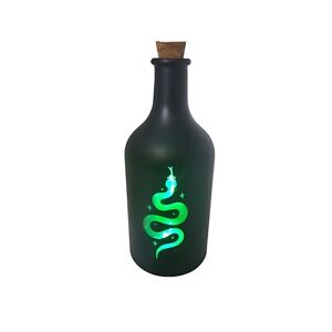 vintage 1990s novelty changing multicolor lights snake design potion bottle.