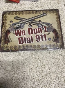 RIVERS EDGE TIN SIGN "WE DON'T DIAL 911" 12"x17" - Picture 1 of 10