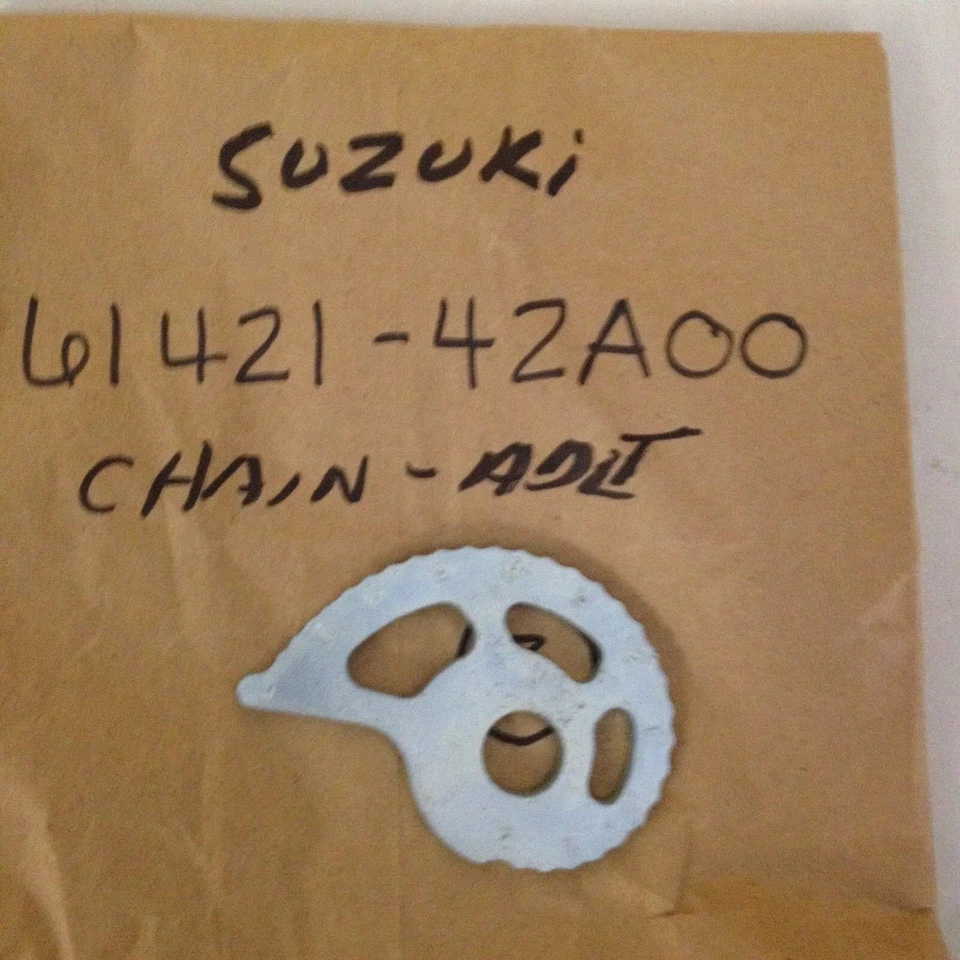 AJUSTADOR DE CADENA SUZUKI DR200 DR125 SP125 SP200 1986-2019 61421-42A00 Foto 1 de 1