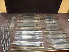 Huge lot of Atlas HO re-railers&#160; (19) ...9&quot; + 3 pieces of loose track