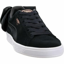black puma trainers with bow