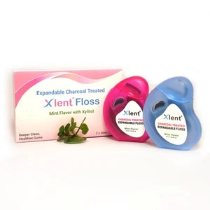 Expandable Dental Floss Treated with Activated Charcoal with Xylitol and Natu... - Picture 1 of 8