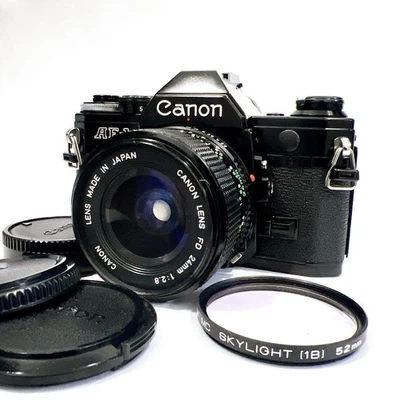 [EXC+5] Lente Canon AE-1 negra/nueva FD 24 mm f:2,8 NFD MF @ CS SAKuRA de JAPÓN #1 Foto 1 de 4