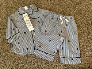 NUEVO NUEVO CON ETIQUETAS Baby Gap niño calavera huesos cruzados pijama de 2 piezas 6 12 botones - Imagen 1 de 5