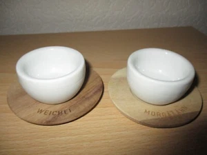 2 Eierbecher mit Holzteller von Räder. Ungebraucht. - Bild 1 von 2