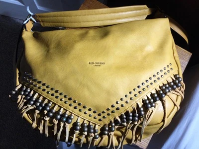 Brand new with tags ladies Mustard handbag with metal studs and fringes  - Image 1 of 4