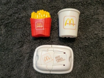 Juguetes de comida feliz robot/inosaurios transformadores de bebidas, papas fritas y pasteles calientes McDonalds Foto 1 de 4
