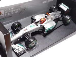 MINICHAMPS 1:18 MERCEDES W03 M. SCHUMACHER LAST RACE BRAZIL GP 2012 - Picture 1 of 11