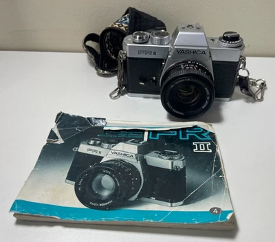 Yashica FR II 35mm SLR Camera bundle w/ 50mm Lens Strap And Manual Untested - Image 1 of 4