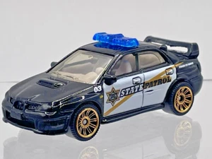 Tarjeta corta Matchbox 2013 MB94 Subaru Impreza WRX coche de policía 'State Patrol' - Imagen 1 de 5