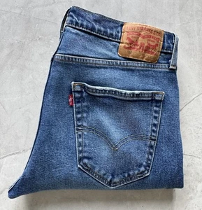 Pantalones de mezclilla para hombre Levis 512 azul medio lavado elástico W 35” x L 32” - Imagen 1 de 6