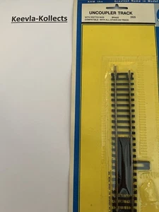 AHM #2525 HO Gauge Code 100 Rail Un-coupler Track & Switch - New in Packet - Picture 1 of 2