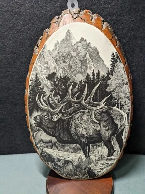 Bugling Six Point Bull Elk Forest and Teton Mountains Wall Art on Oval wood  - Image 1 of 4