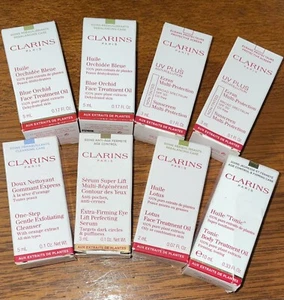 Lot Of 8 Various Travel Size Clarins Paris Products Face Oil Sunscreen Eye Firm - Picture 1 of 3