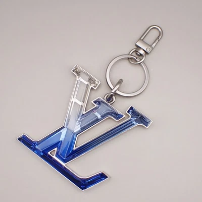 LOUIS VUITTON Bijoux Sac LV Bolso Prisma Dije Plateado Azul MP2365 61YH697 Foto 1 de 4