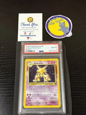 2000 - Pokémon Base Set 2 - ALAKAZAM - HOLO With Swirl 🌀 # 1/130 - PSA 8 - - Image 1 of 4