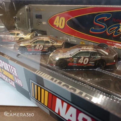 Carros NASCAR Racing Champions 1:64 Transporter Sterling Marlin ouro cromado prata - Imagem 1 de 4