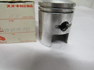 NOS Genuine Suzuki TM75 74-76 TS75 75-77 1st over size piston 12110-26101-025 - Picture 1 of 3