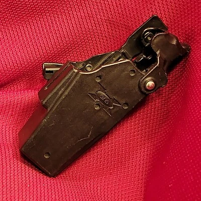 Black TASER HOLSTER X-26  Series w/ HOOD RETENTION Blade Tech RIGHT HAND belt - Image 1 of 4