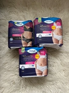 Tena Silhouette Pants Gr. M 2x und GR. L 1x , schwarz weiß 2 x 12 Stück & 1x 10 - Bild 1 von 1