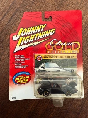 Porsche 911 Carrera Johnny White Lightning 1986 clásico dorado nuevo en stock negro azabache d3 Foto 1 de 4