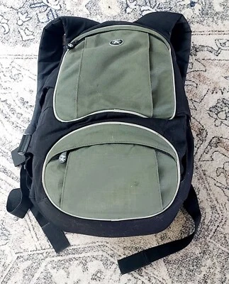 Mochila para equipo de cámara Crumpler The Schrinkle negra verde nailon acolchada resistente Foto 1 de 4