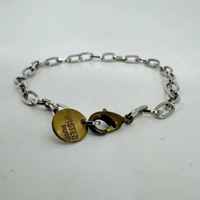 "Brazalete artesanal de eslabones ovalados tono plata retorcida 7""" Foto 1 de 4