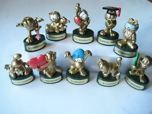 KINDER FERRERO BRIOSS SURPRISE SÉRIE COMPLETE 10xGOLDEN GARFIELD VINTAGE TOP RAR - Photo 1/3