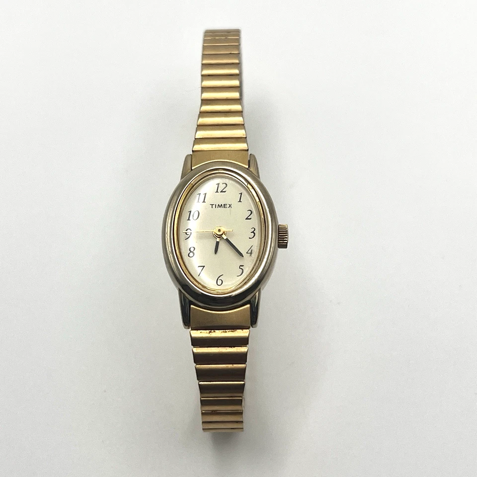 Reloj Timex Vintage Mujer Tono Dorado Funcionamiento Elastizado Correa Ajustada COMO ESTÁ Foto 1 de 4