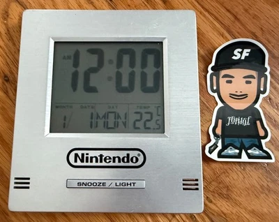 VTG ORIGINAL NINTENDO PROMO SILVER DIGITAL ALARM DATE CLOCK EMPLOYEE DISPLAY Y2K - Image 1 of 4