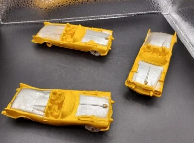 Lote de 3 coches Cadillac amarillo goma castaño rojizo Foto 1 de 4