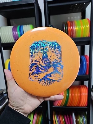 Infinite discs Metal Flake Orange 173-5g #2 Glow Centurion Disc Golf Driver - Image 1 of 3