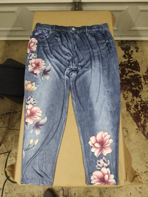 women's plus-size jeggings with a floral print on a faux denim background - Image 1 of 4