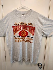 Camiseta God Bless Our Firefighters Departamento de Bomberos  - Imagen 1 de 2