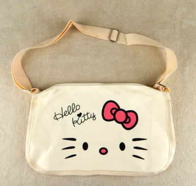 Hello Kitty 奶油色帆布斜挎包单肩包钱包带可调肩带新品 — 第 1/3 张图片