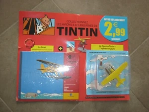 TINTIN AVION 1 HYDRAVION JAUNE + CARTON + LIVRE NEUF SOUS BLISTER - Picture 1 of 2