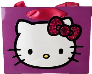PAPYRUS Hello Kitty Schmuck Schleife lila rosa Band Griffe Sanrio Geschenktüte NEU - Bild 1 von 6