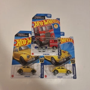 2025 Hot Wheels TRANSFORMERS Optimus Prime & Gold & Yellow Bumblebee - Picture 1 of 11